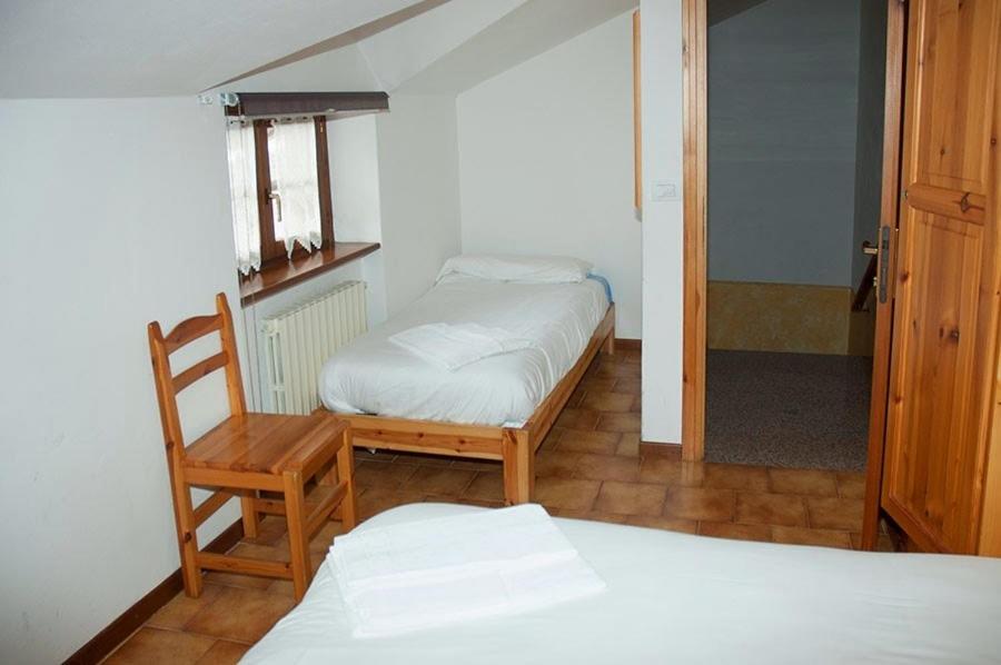 Postel nebo postele na pokoji v ubytování Casa Vacanze Ca' De Val