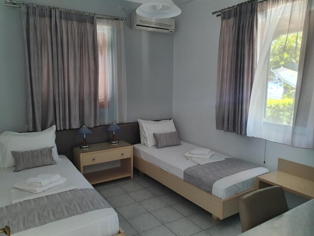 Posteľ alebo postele v izbe v ubytovaní Daglas Beach House