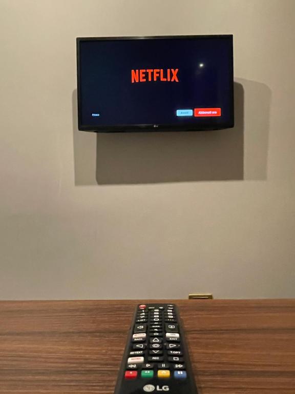 TV a/nebo společenská místnost v ubytování Ninfa hotel