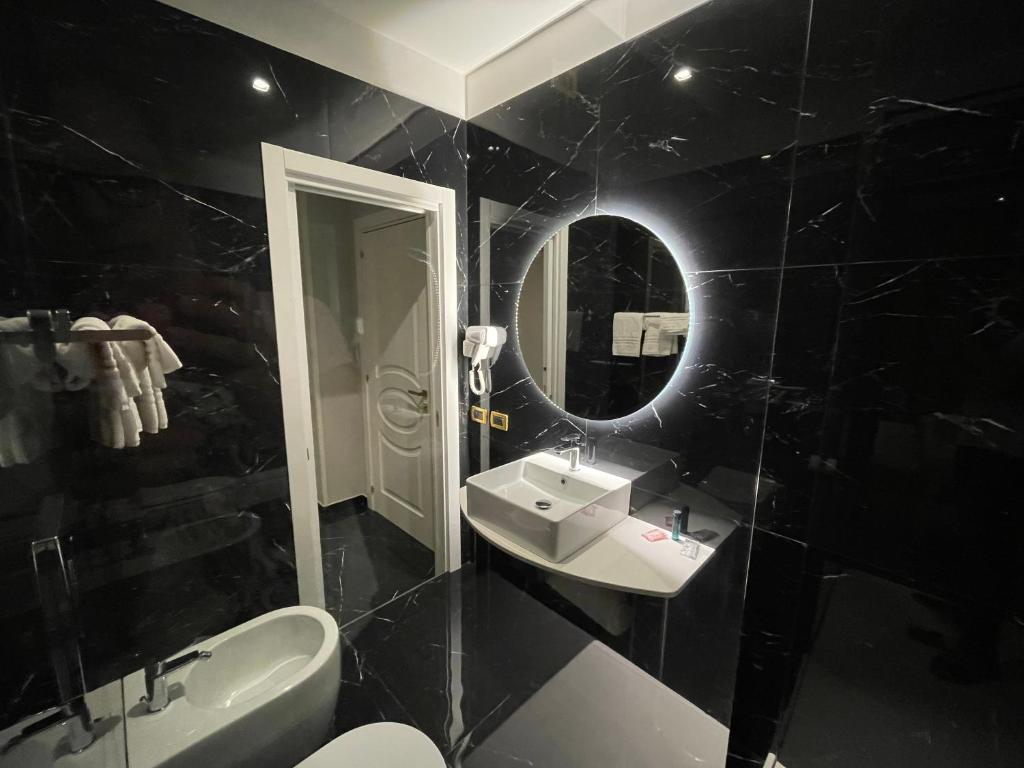 Koupelna v ubytování Ninfa hotel