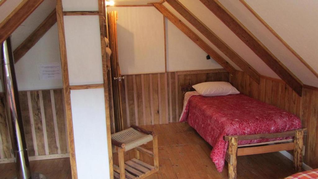Uma cama ou camas num quarto em Cabañas Turin
