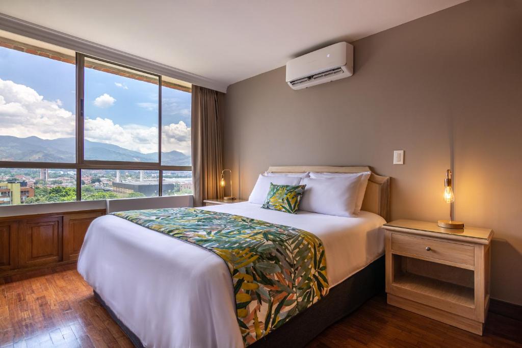 Postel nebo postele na pokoji v ubytování Alcazar de Oviedo by EE Hoteles
