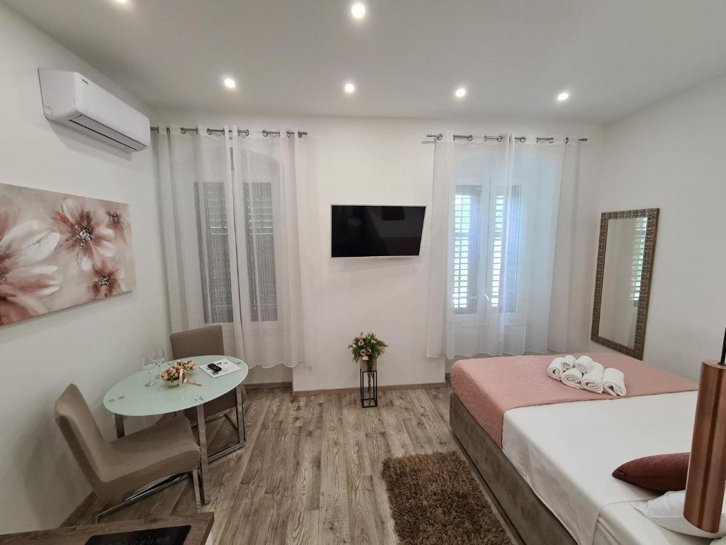 TV a/nebo společenská místnost v ubytování D&D Suites in Split Centre