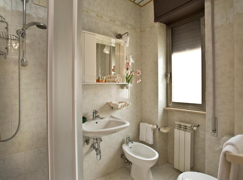 Koupelna v ubytování Hotel Siviglia