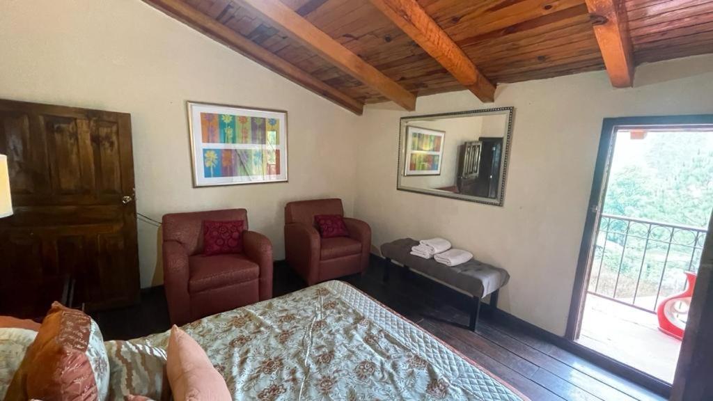 Postel nebo postele na pokoji v ubytování Cabañas Yasmina