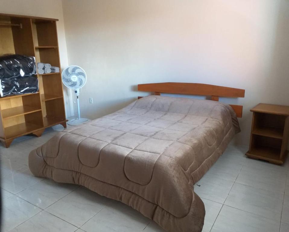 Cama ou camas em um quarto em Cantinho do Sossego III - Com Lareira