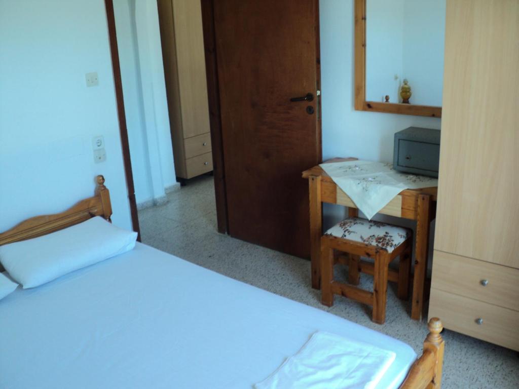 Ein Bett oder Betten in einem Zimmer der Unterkunft Katerina Apartments