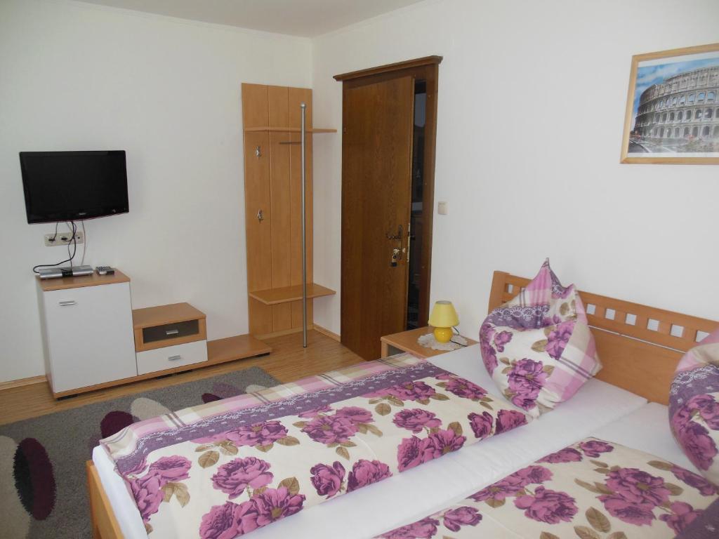 Postel nebo postele na pokoji v ubytování Ferienhaus Moser