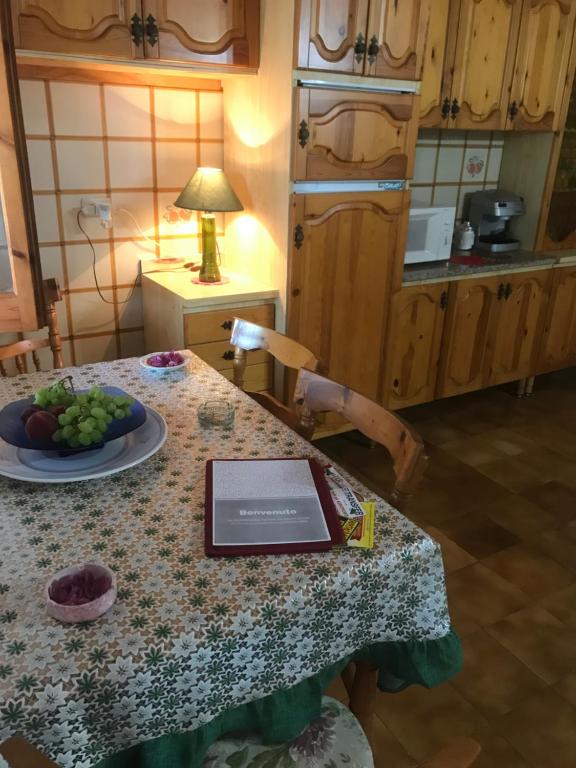 A kitchen or kitchenette at Villetta Romeo Casavacanze