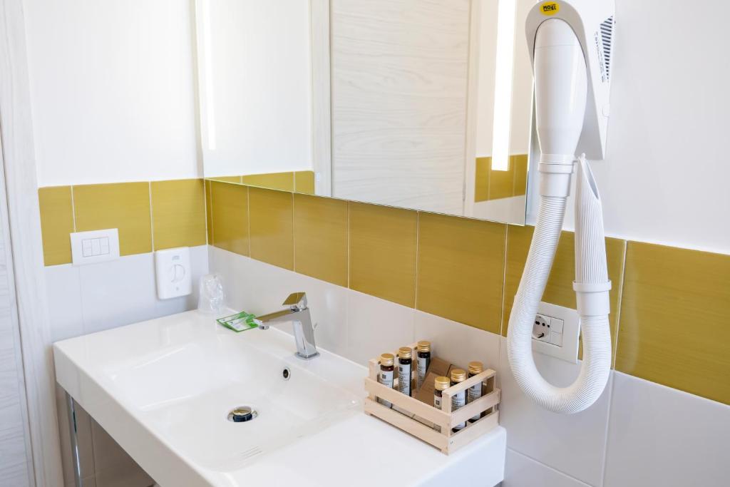 a bathroom with a sink and a shower at Casa Marino in Sorrento