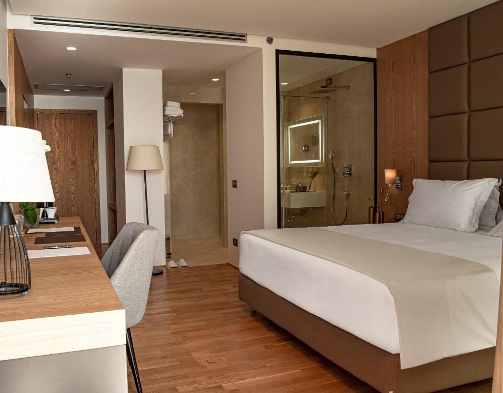Postel nebo postele na pokoji v ubytování Amare Hotel
