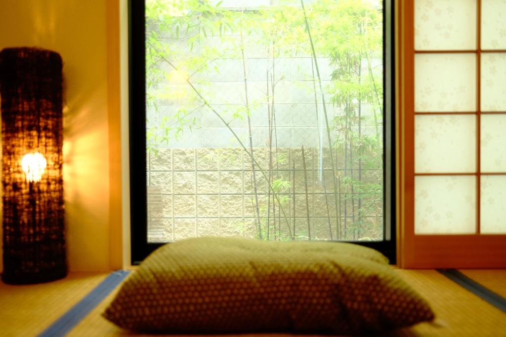 Kamon Inn 東寺 ひょうたんにあるベッド