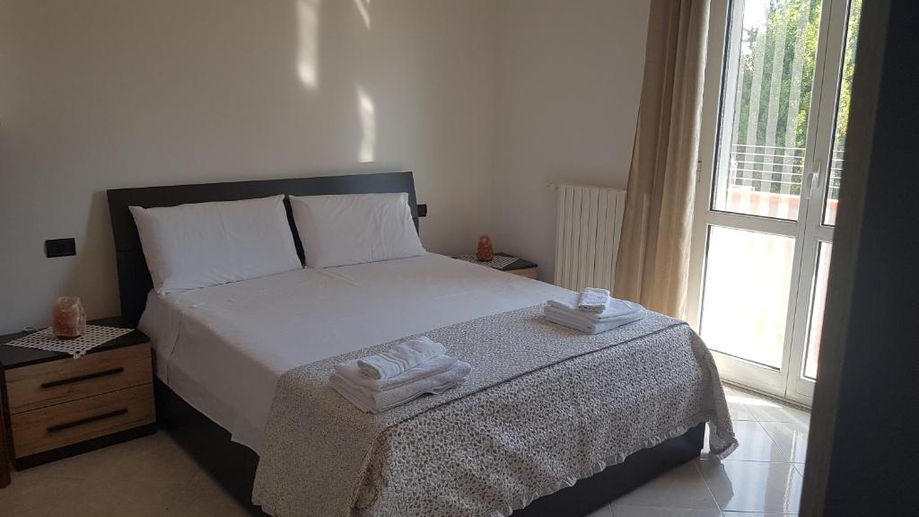 Postel nebo postele na pokoji v ubytování B&B Da Pietro