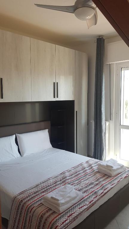 Postel nebo postele na pokoji v ubytování B&B Da Pietro