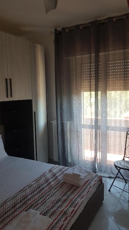 Postel nebo postele na pokoji v ubytování B&B Da Pietro