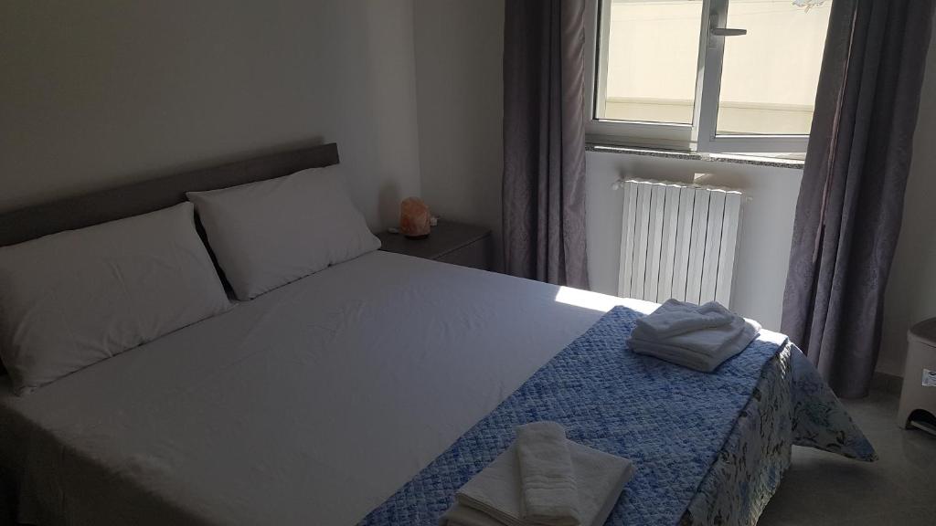 Postel nebo postele na pokoji v ubytování B&B Da Pietro