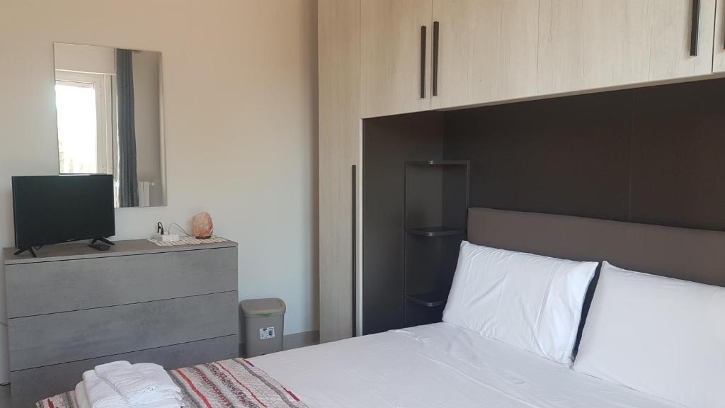 Postel nebo postele na pokoji v ubytování B&B Da Pietro