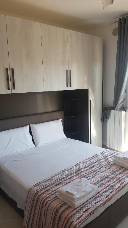 Postel nebo postele na pokoji v ubytování B&B Da Pietro