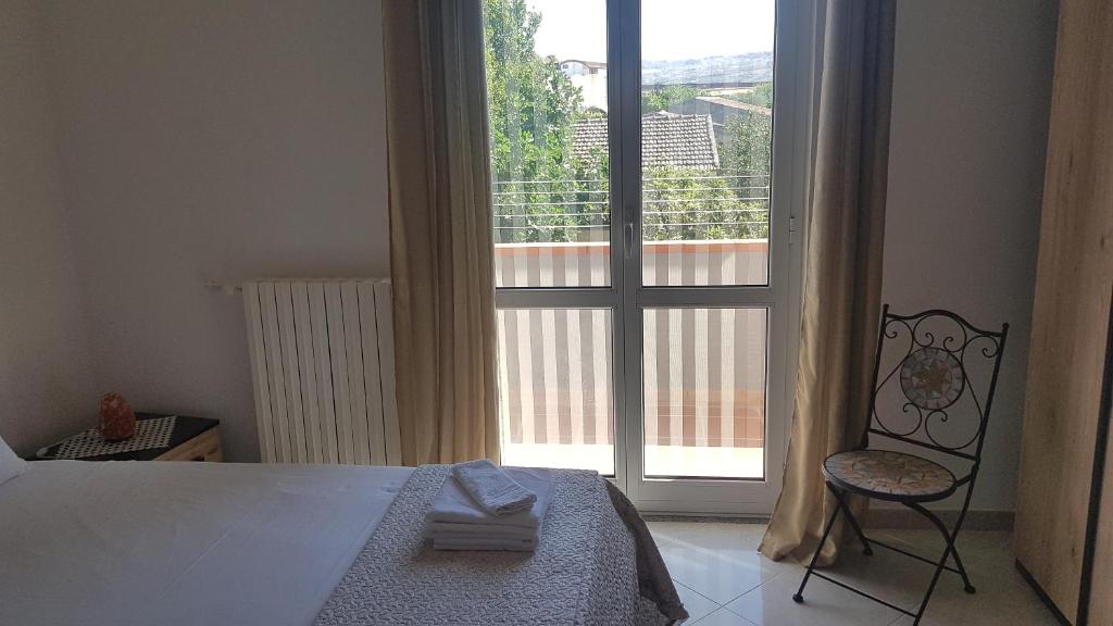 Postel nebo postele na pokoji v ubytování B&B Da Pietro