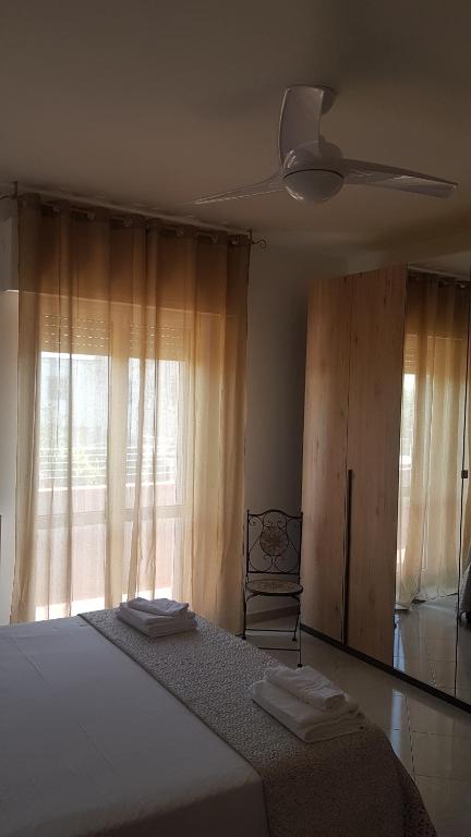 Postel nebo postele na pokoji v ubytování B&B Da Pietro