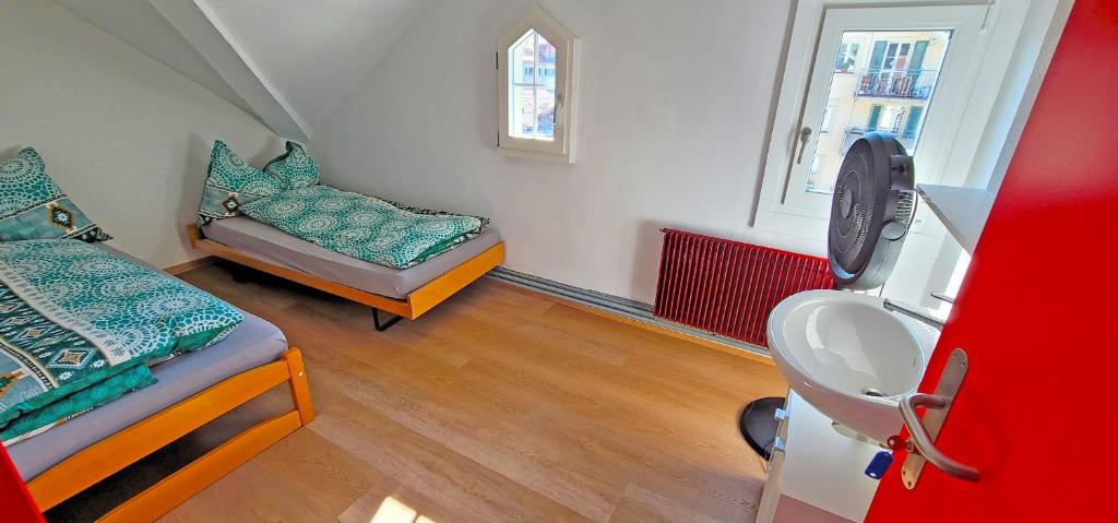Postel nebo postele na pokoji v ubytování Sonne Holiday Rooms