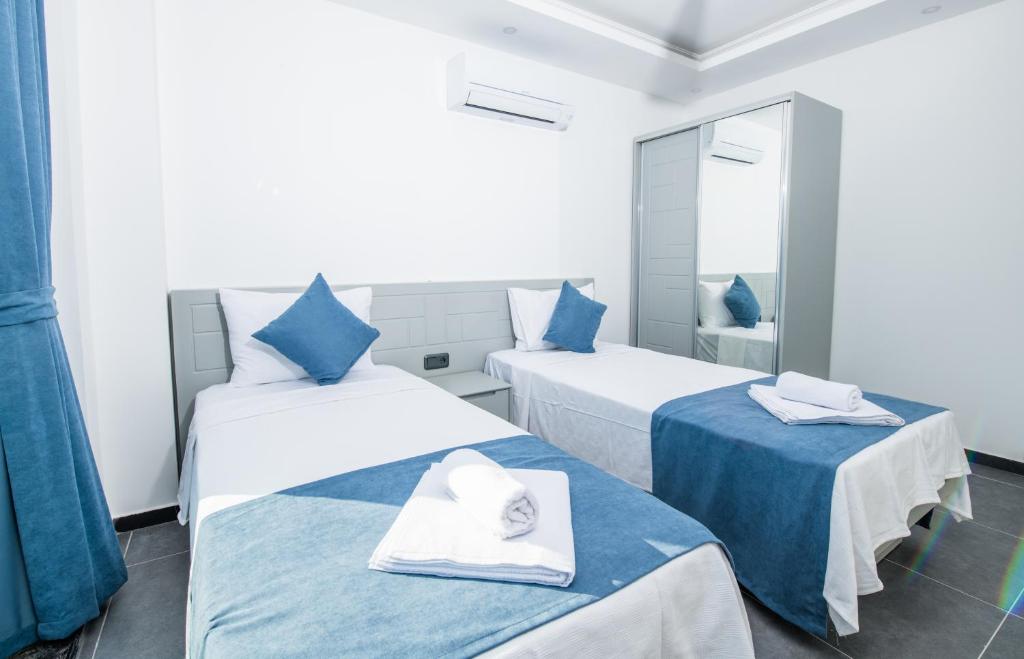 Postel nebo postele na pokoji v ubytování Villa Deida & Laoda