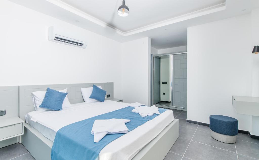 Postel nebo postele na pokoji v ubytování Villa Deida & Laoda