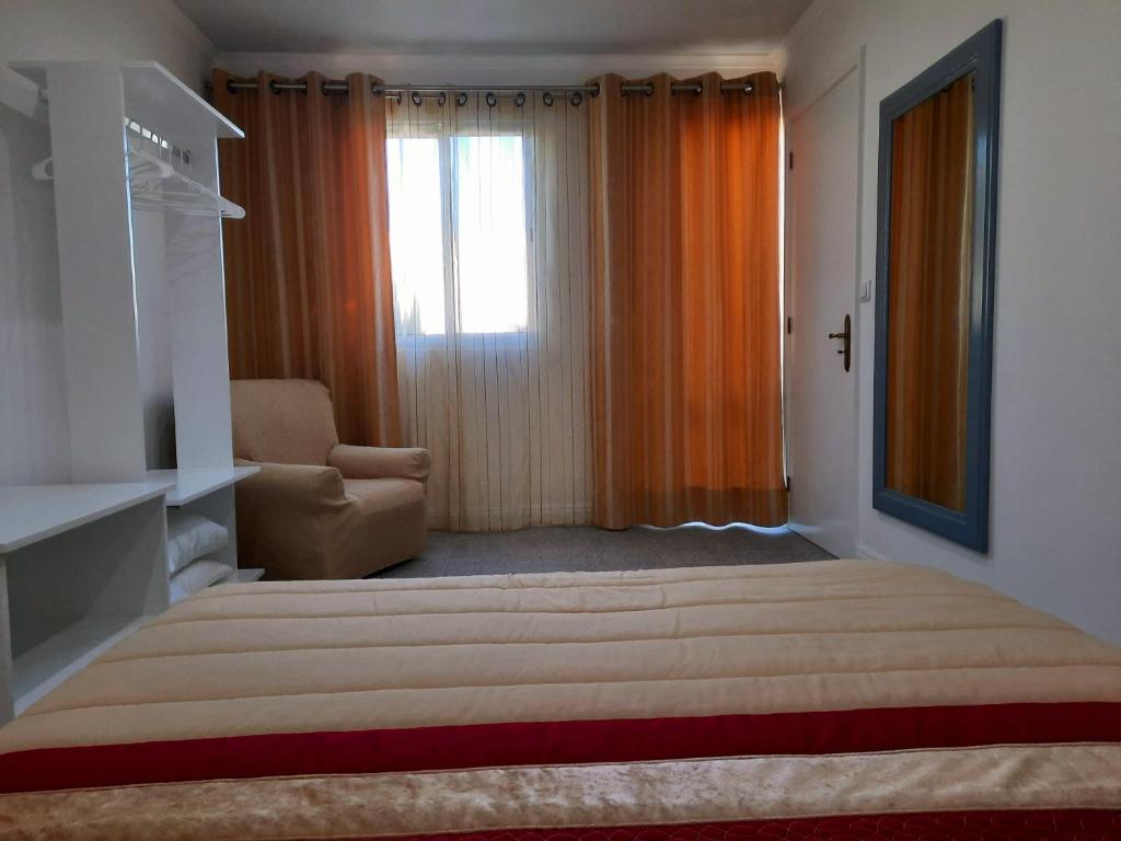 Postel nebo postele na pokoji v ubytování Arrivillage