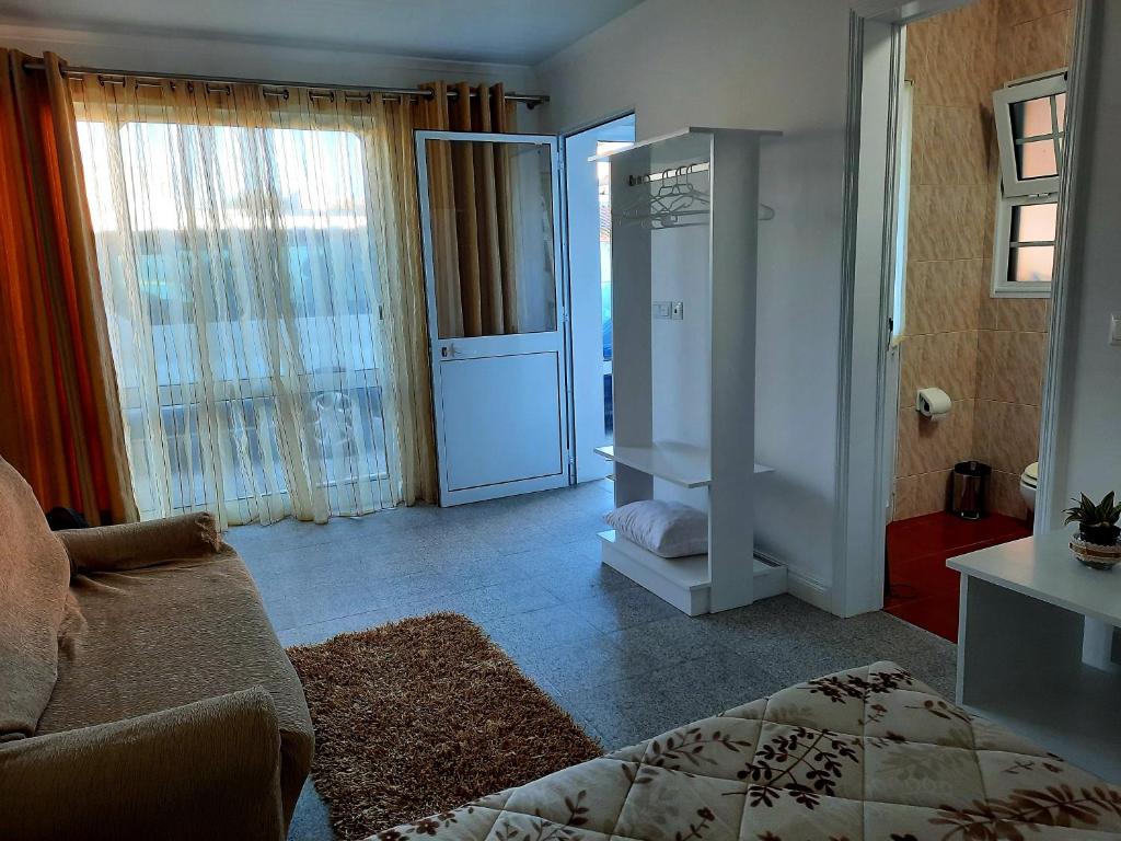 Postel nebo postele na pokoji v ubytování Arrivillage