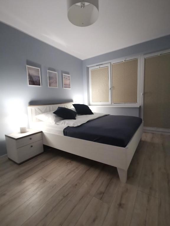 Posteľ alebo postele v izbe v ubytovaní Apartament La Playa