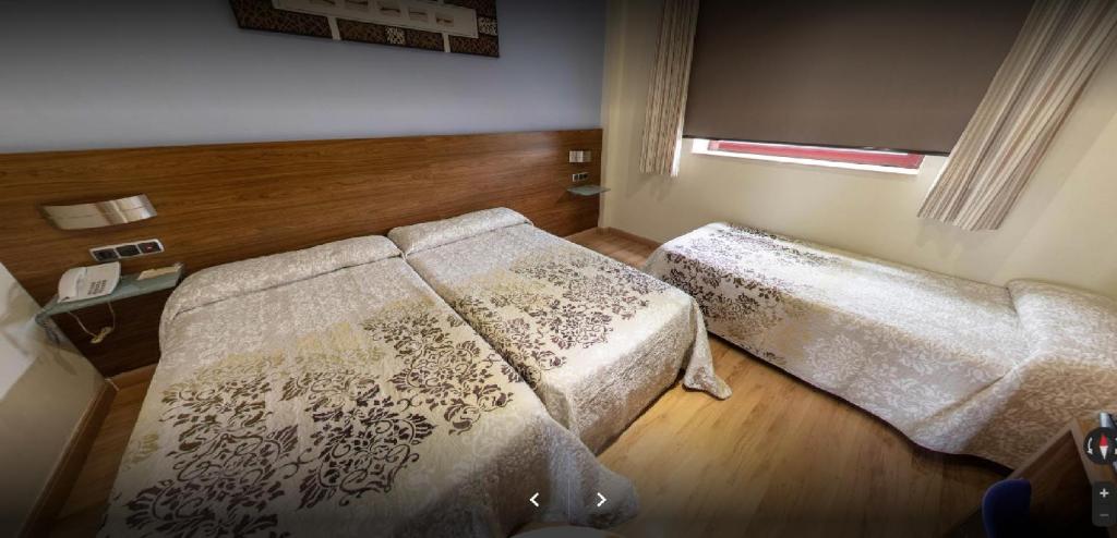 Olimpia Hoteles - Habitación Cuádruple Con Baño