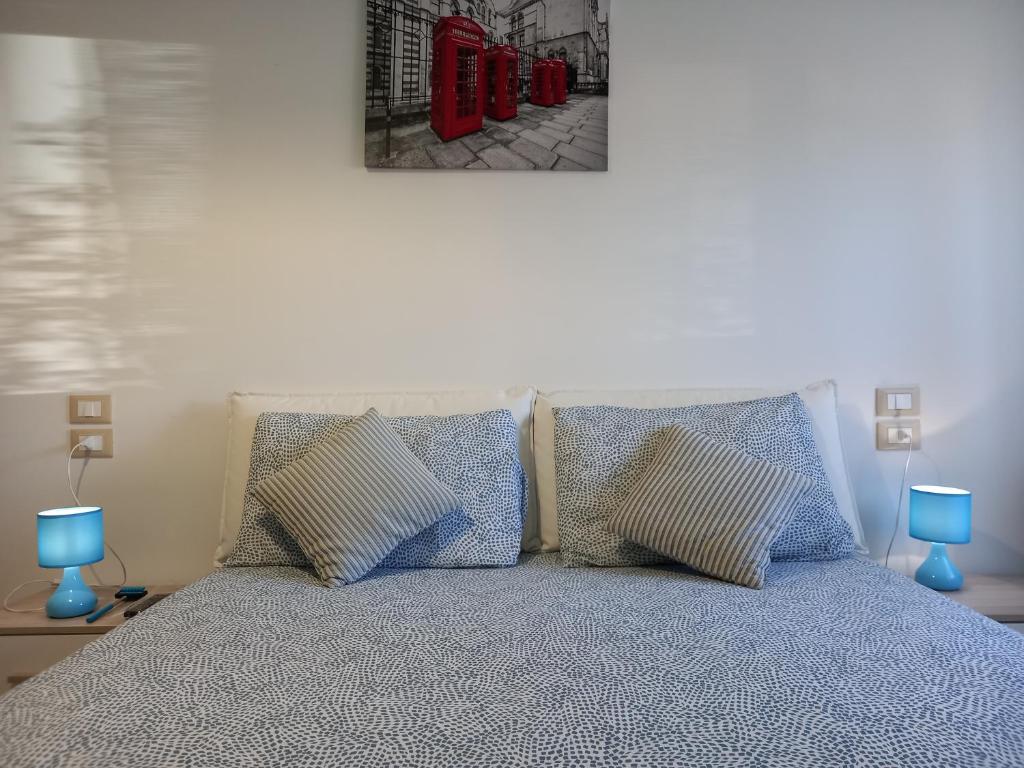 Posteľ alebo postele v izbe v ubytovaní B&B IRIS COTTAGE