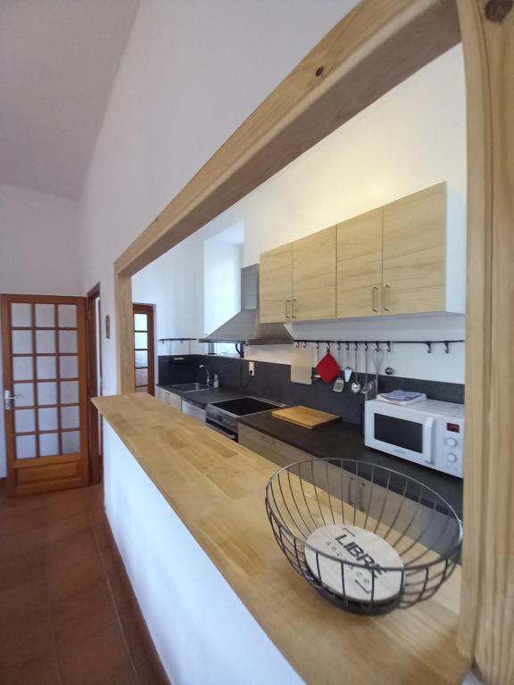 Kuchyň nebo kuchyňský kout v ubytování l'orangerie