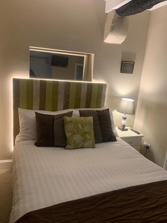Postel nebo postele na pokoji v ubytování 7 Boutique Hotel