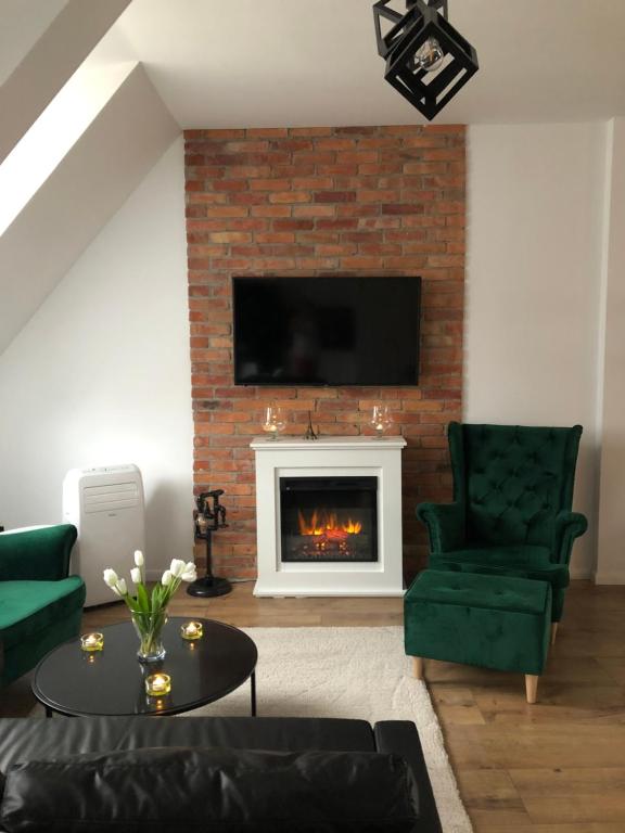 Posedenie v ubytovaní Apartament Zielone Fotele Starówka