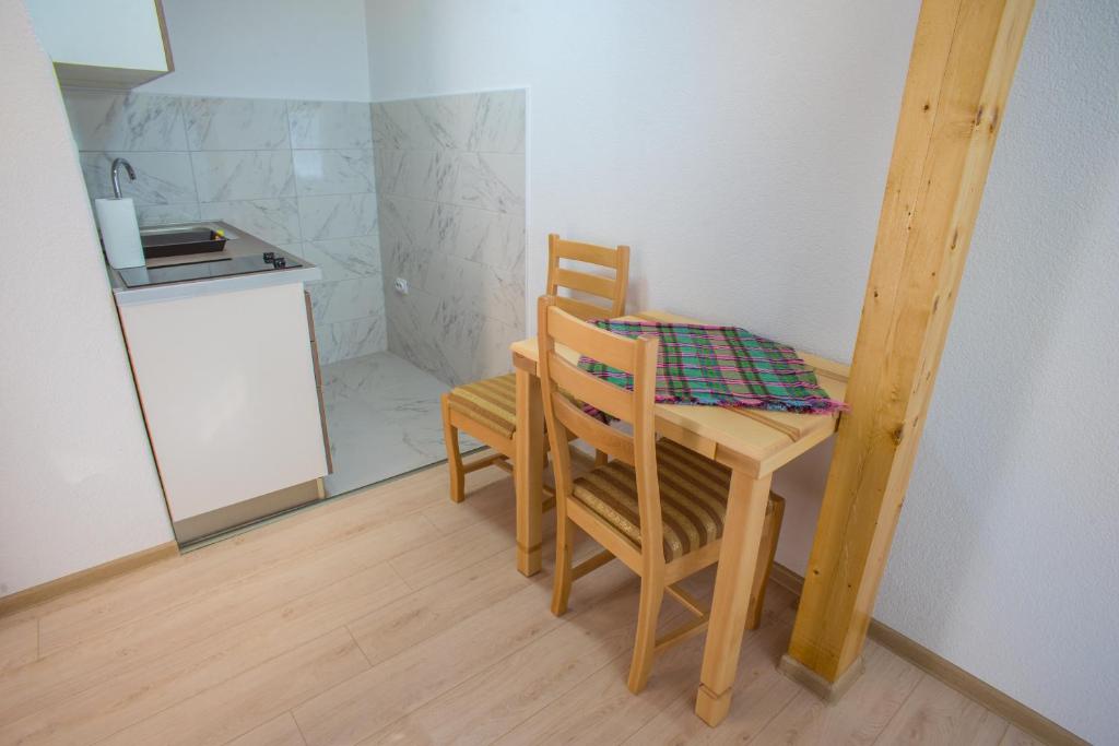 Kuchyň nebo kuchyňský kout v ubytování Apartments Stevovic