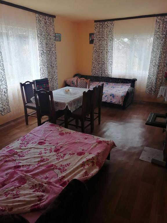 Postel nebo postele na pokoji v ubytování Etno Kuca Badejevic