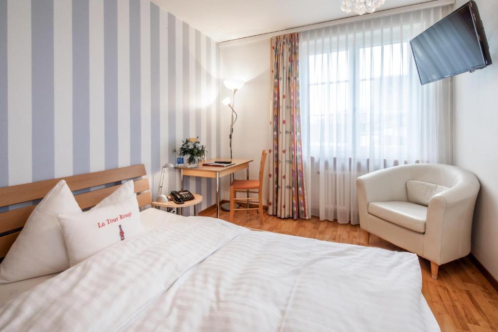 Postel nebo postele na pokoji v ubytování Hotel Roter Turm