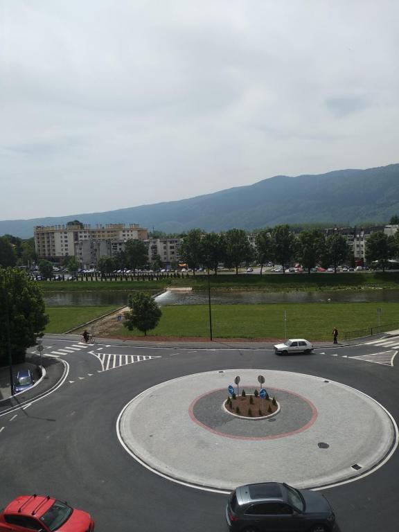 a roundabout with people in a circle in the middle of a street at PashaNo1 in Sarajevo