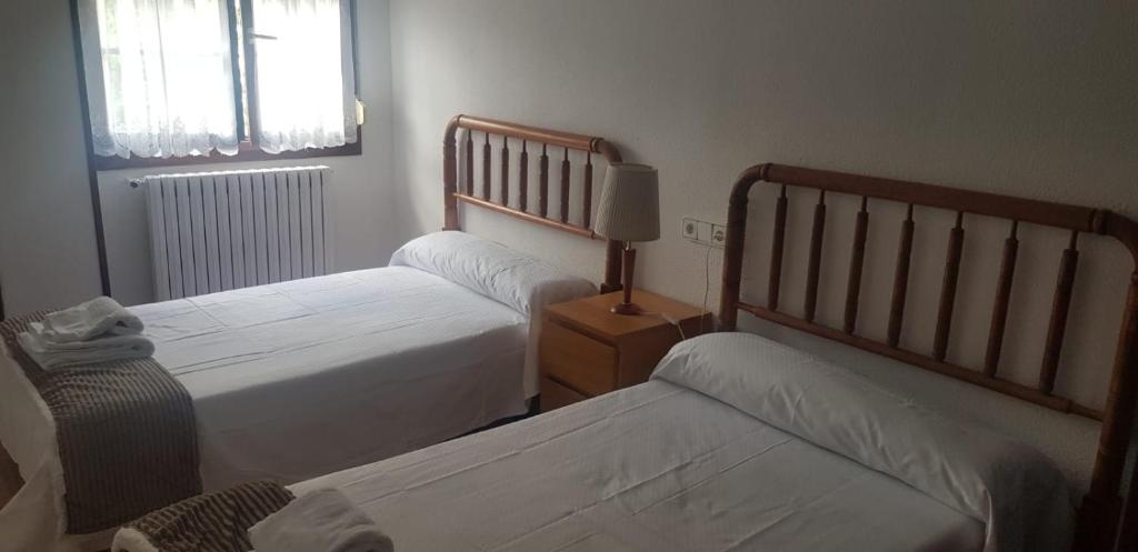 Postel nebo postele na pokoji v ubytování MyM