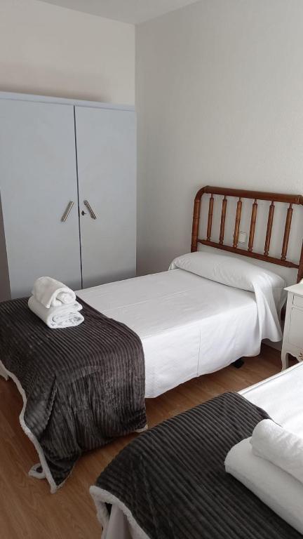 Postel nebo postele na pokoji v ubytování MyM