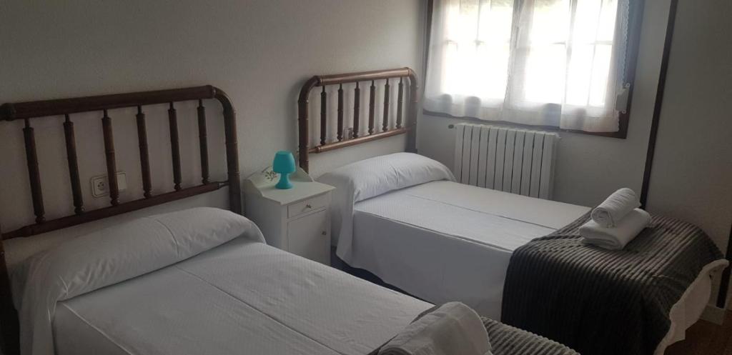 Postel nebo postele na pokoji v ubytování MyM