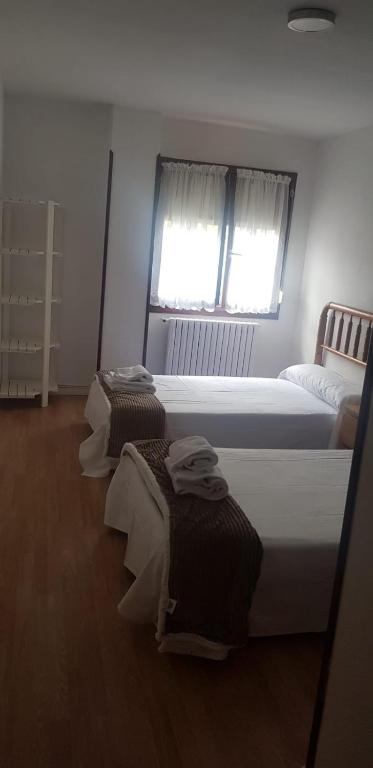 Postel nebo postele na pokoji v ubytování MyM