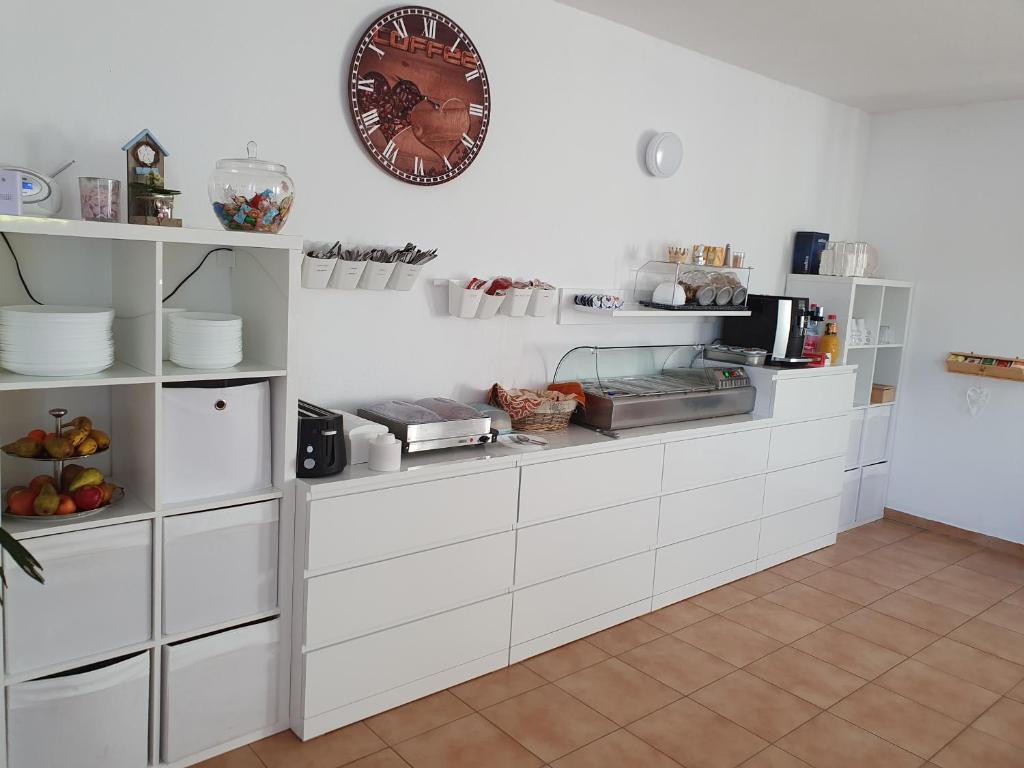 Kuchyň nebo kuchyňský kout v ubytování Mainstern Hotel