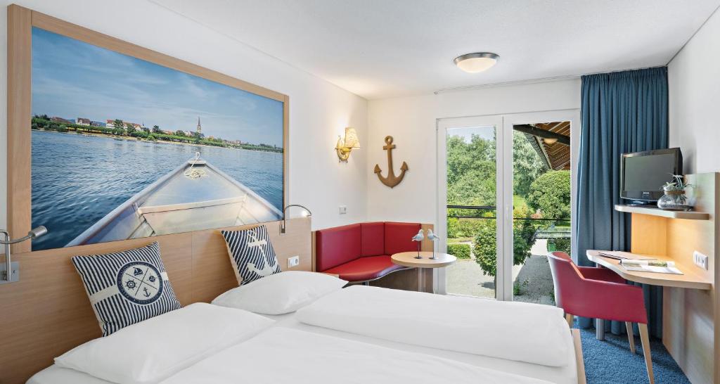 Postel nebo postele na pokoji v ubytování Gasthaus Schiff