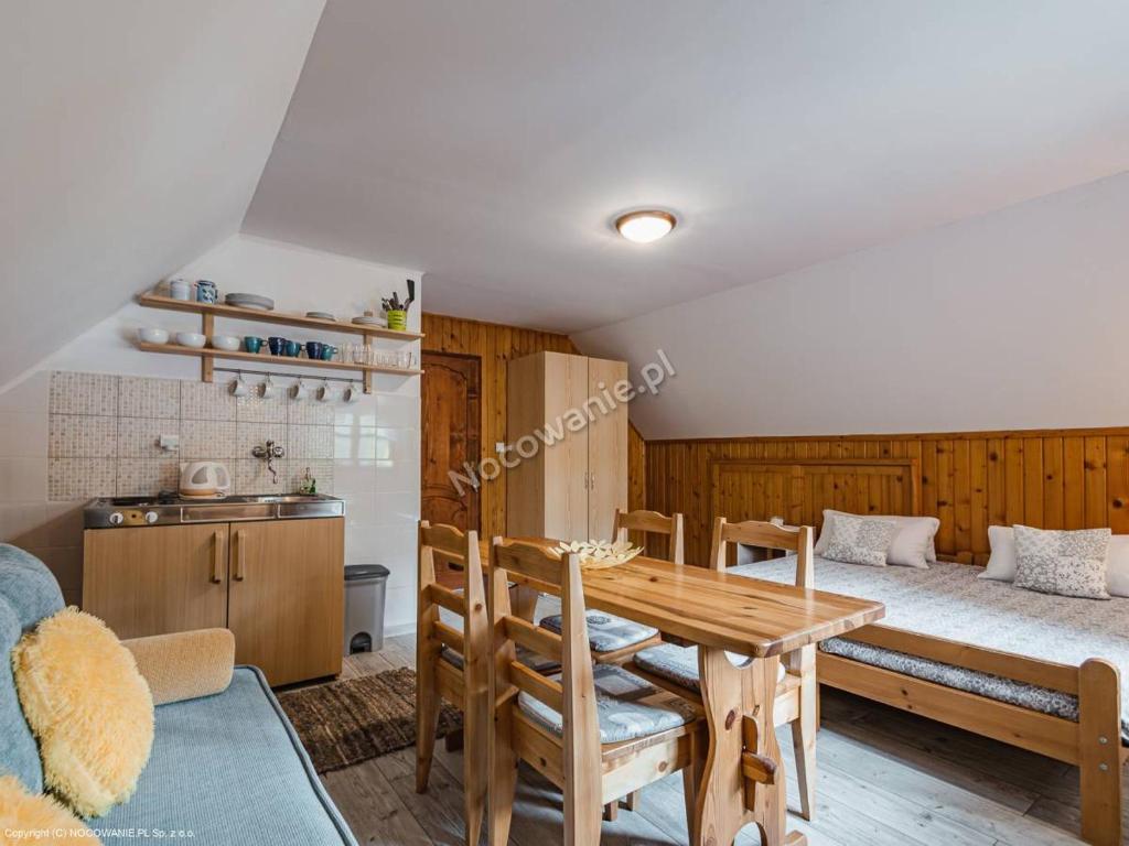 Postel nebo postele na pokoji v ubytování Penzion u Laca