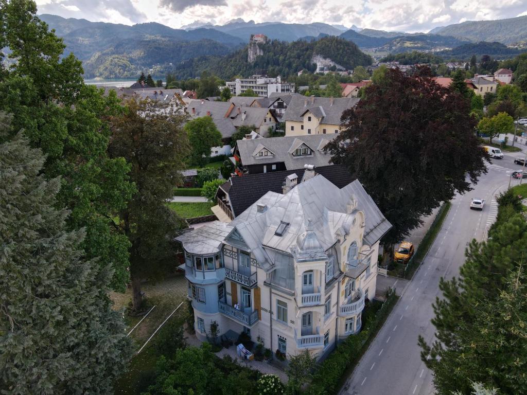 an aerial view of a large house in a town at Vila Ana Generoes Bled in Bled