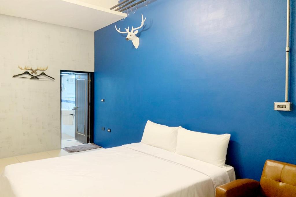Postel nebo postele na pokoji v ubytování SNUG·NINE Hotel