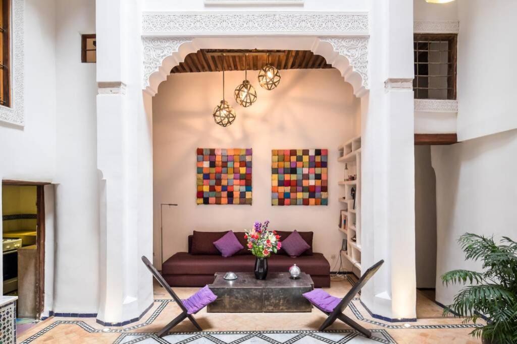 a living room with a couch and chairs at COZY BUT TRENDY RETREAT IN MEDINA in Fez