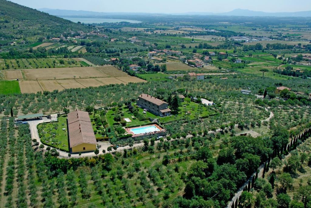 an aerial view of a large estate with a pool at Agriturismo Cortoreggio in Cortona